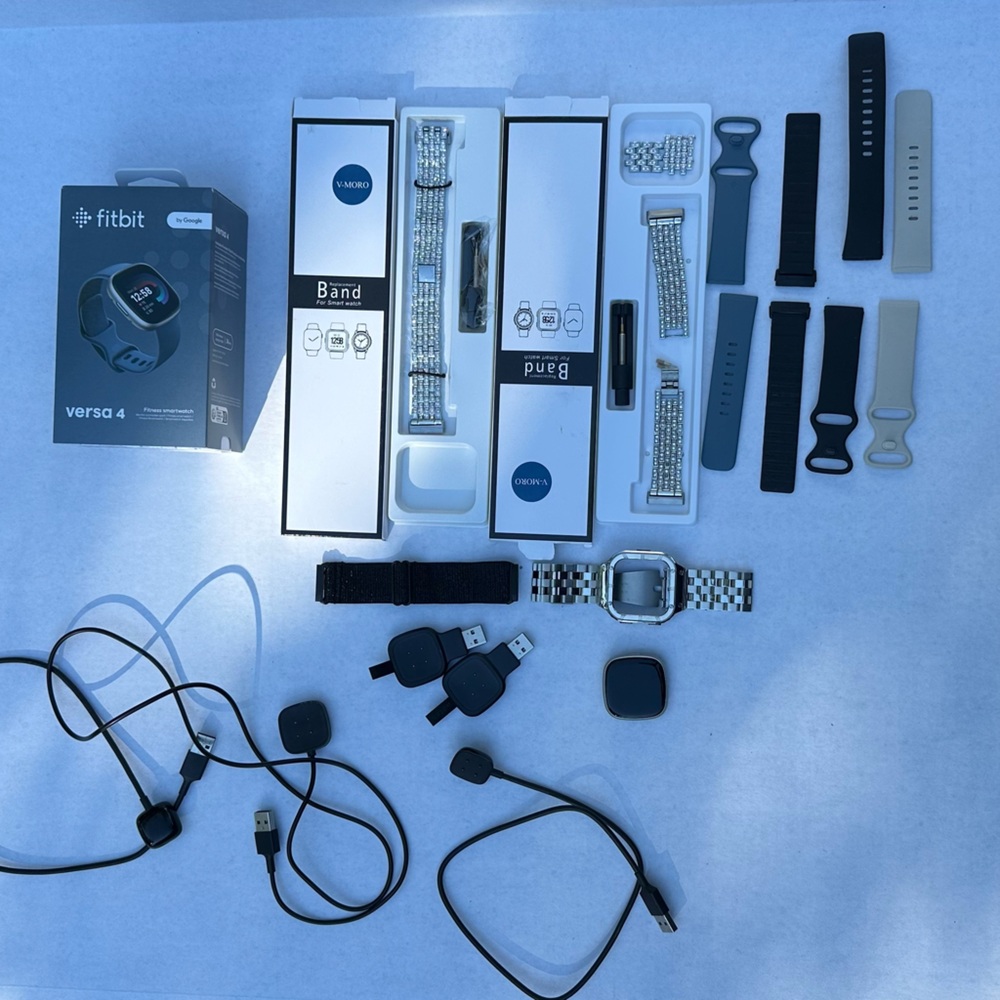 Fitbit Versa 4 Smartwatch with bands & chargers